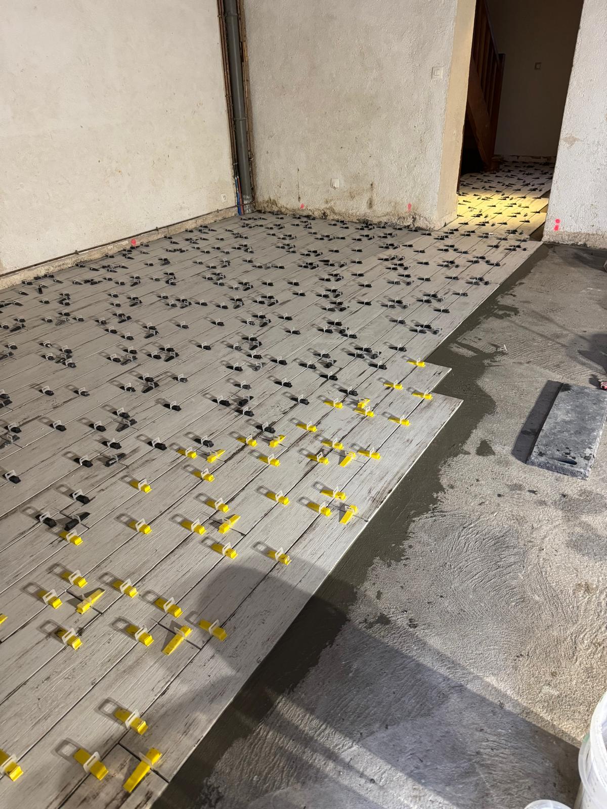 Pose carrelage salon Sarcelles